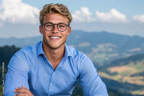 Elevate Your Brand with a Professional Headshot Young Smiling Man in Glasses Posing Against a Clean Modern Backdrop Ideal for Personal Branding and Networking This high-quality image captures