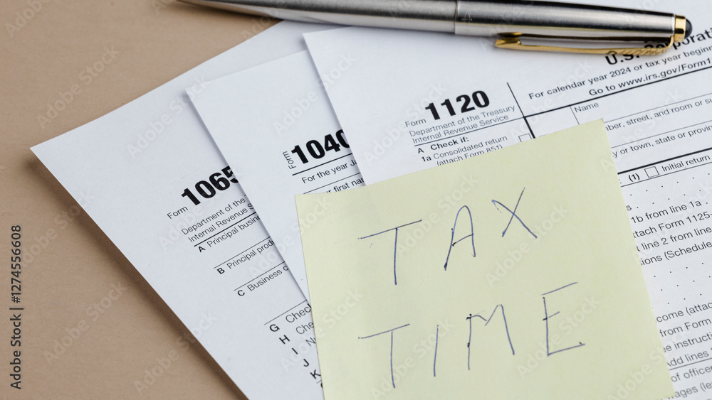 Tax Season: Forms, Pen, and a Reminder Note. Organize your financial documents for filing deadlines. Don't forget to file on time! Tax Season: Forms, Pen, and a Reminder Note. Organize your financial documents for filing deadlines. Don't forget to file on time!