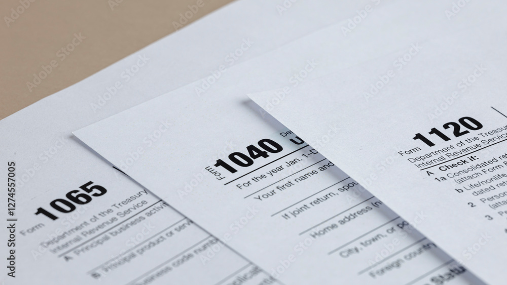 Tax season: various tax forms including 1040, 1065, and 1120 forms representing individual, partnership, and corporate tax obligations. Tax season: various tax forms including 1040, 1065, and 1120 forms representing individual, partnership, and corporate tax obligations.
