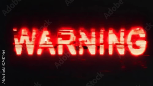 warning text on digital screen with glitch effect in red neon light, dark background, cybersecurity and alert concept.