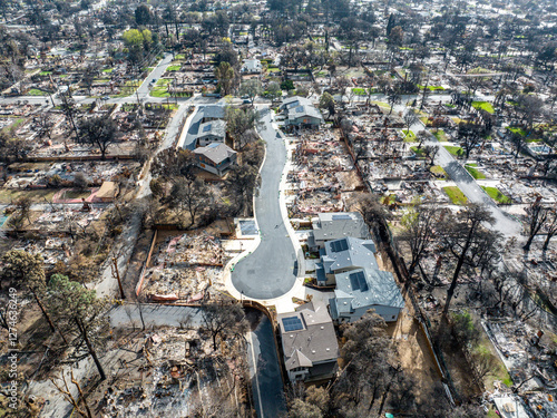 Obraz na plátně Aerial view of the Eaton Fire destruction in Altadena, California, showing entir