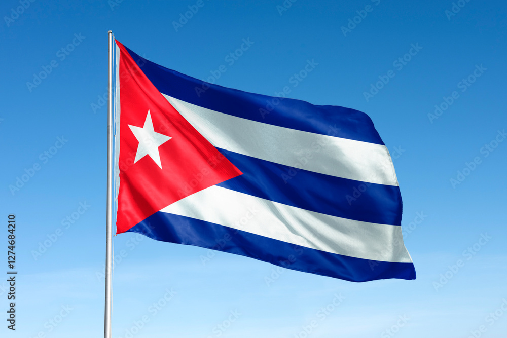 Fototapeta premium Waving Cuban flag, national symbol, blue sky