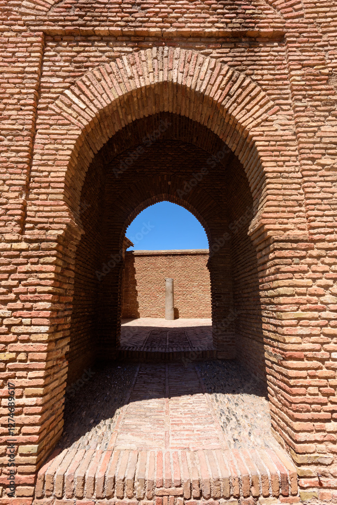 Malaga, Spain - August 06, 2024: Walls and bastion of the castle fort Gibralfaro in Malaga. Castillo de Gibralfaro.