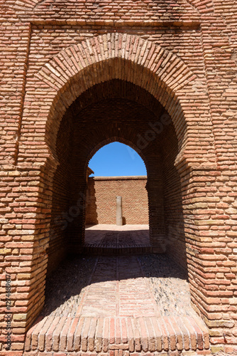 Obraz na płótnie Malaga, Spain - August 06, 2024: Walls and bastion of the castle fort Gibralfaro in Malaga. Castillo de Gibralfaro. w salonie