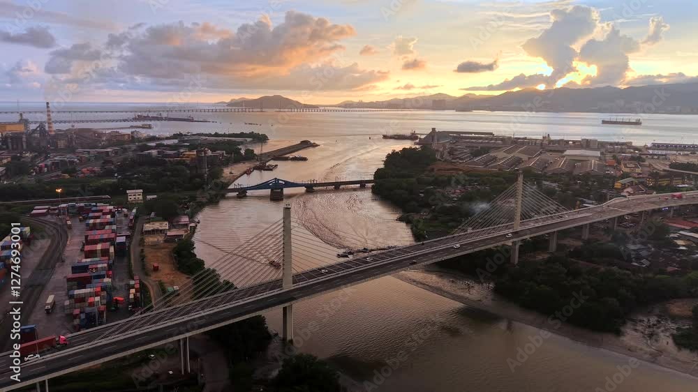 Butterworth, Penang, Malaysia aerial drone video at sunset of traffic on bridge over the Prai River at sunset looking towards Penang Island Butterworth, Penang, Malaysia aerial drone video at sunset of traffic on bridge over the Prai River at sunset looking towards Penang Island