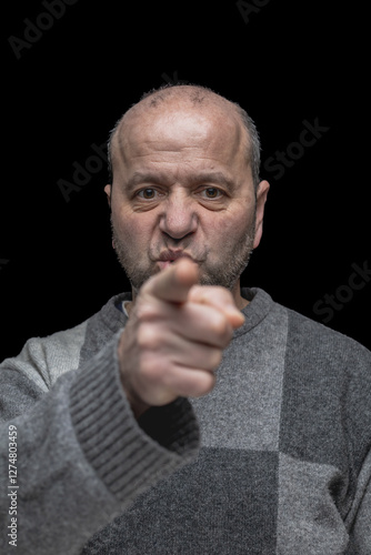 portrait of a senior man looking up