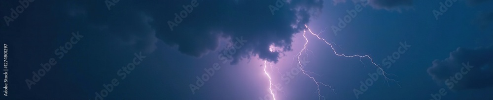 Dark grey clouds fill the night sky with flashes of electric light, stormy night, electric light Dark grey clouds fill the night sky with flashes of electric light, stormy night, electric light