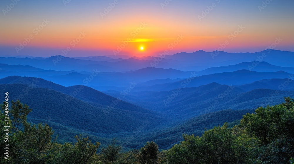 Majestic sunrise over a misty mountain range. Majestic sunrise over a misty mountain range.