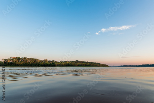 sunrise from the tambopata reserve in puerto maldonado peru photo