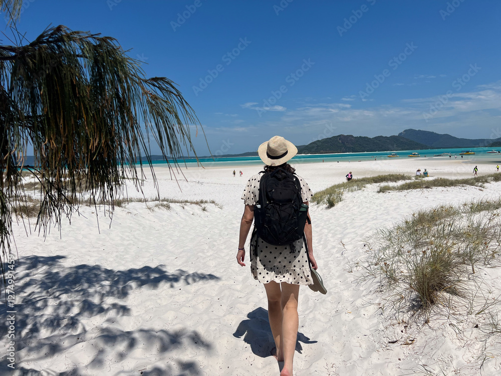 Tourists visit on Whitehaven Beach at Whitsunday Islands National Park Queensland Australia