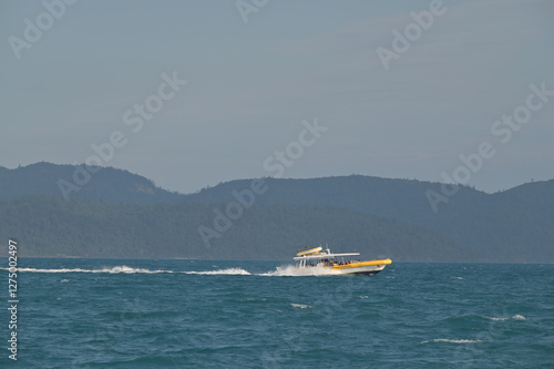 Obraz na płótnie Tourists ride on Ocean Rafting to the Whitsunday Islands Queensland Australia w salonie