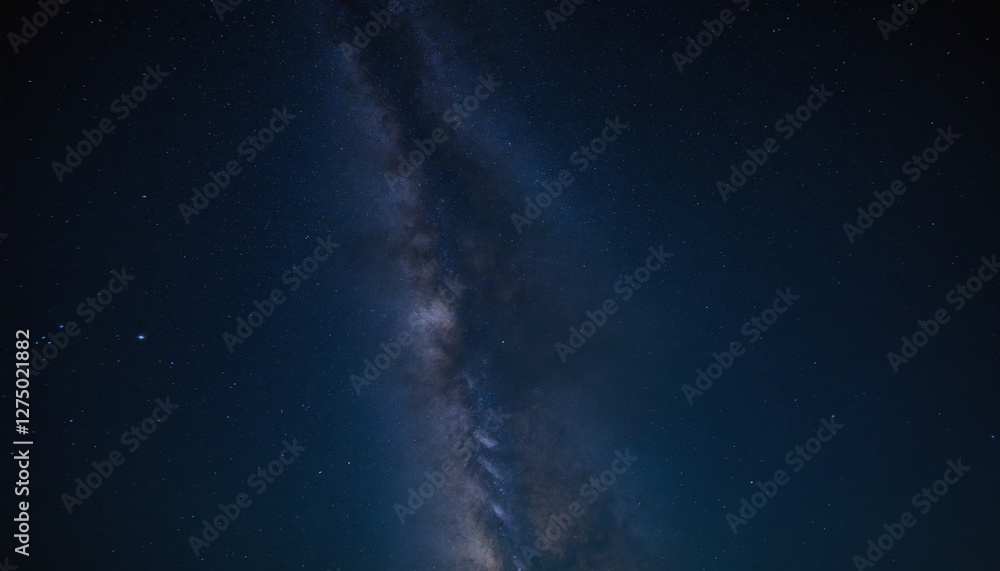 Fototapeta premium Stunning view of the Milky Way galaxy with stars and dark sky, perfect for astrophotography and cosmic exploration