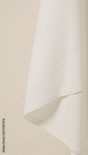 Hand-woven burlap-textured linens with white cotton detail on cream background