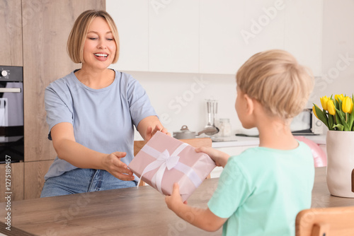 Happy mother receiving gift...