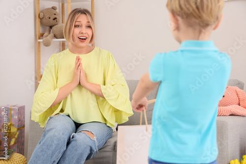 Happy mother receiving gift...
