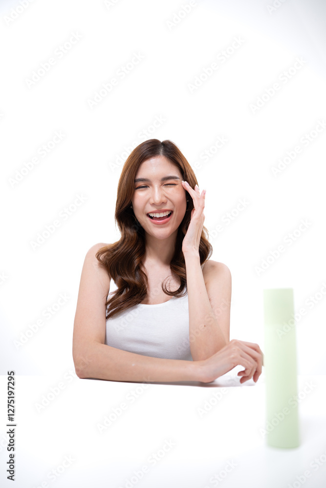 A portrait of a young Asian woman posing in a studio A portrait of a young Asian woman posing in a studio