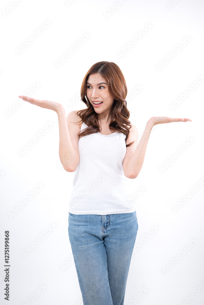 A portrait of a young Asian woman posing in a studio A portrait of a young Asian woman posing in a studio