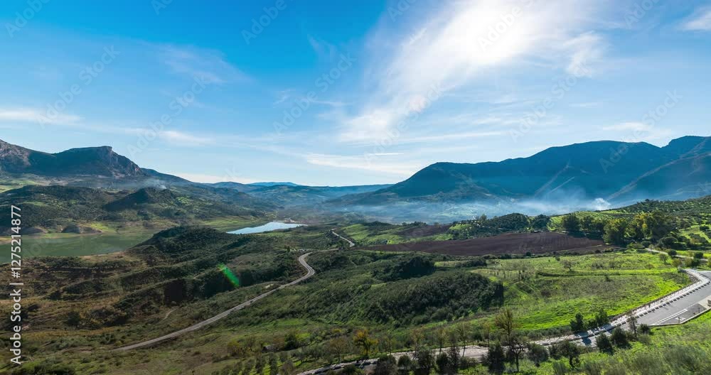 Green and vibrant Spain countryside with mountains, time lapse view Green and vibrant Spain countryside with mountains, time lapse view
