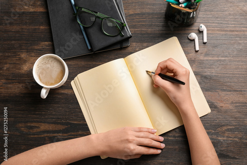 Woman writing something in ...