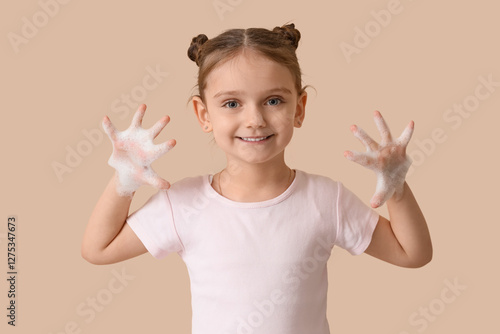Photos Little girl with foam on beige background