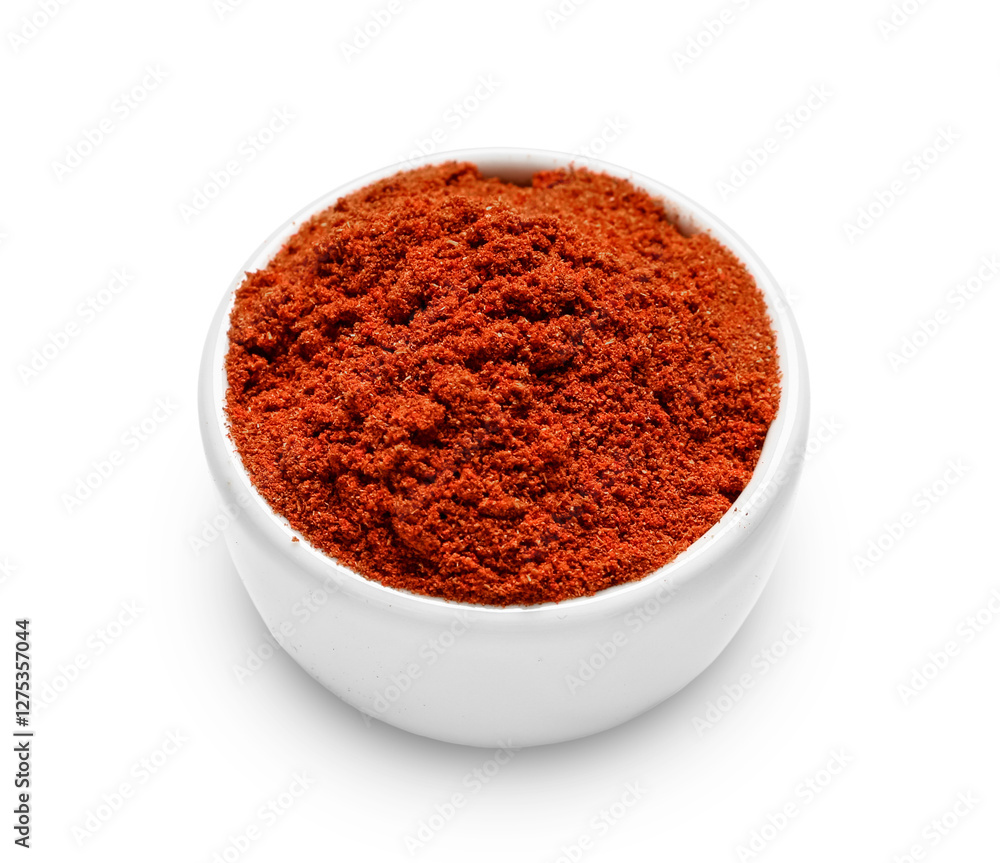 Bowl with aromatic paprika powder isolated on white background Bowl with aromatic paprika powder isolated on white background