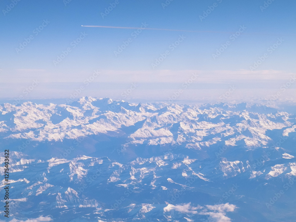 Fototapeta premium The Alps seen from an airplane window.