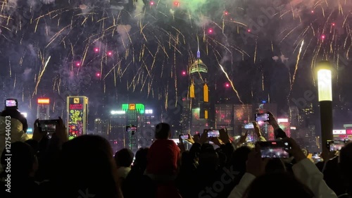 Massive Chinese New Year Countdown Celebration Fireworks in Hong Kong. Spectator view. Celebratory atmosphere.