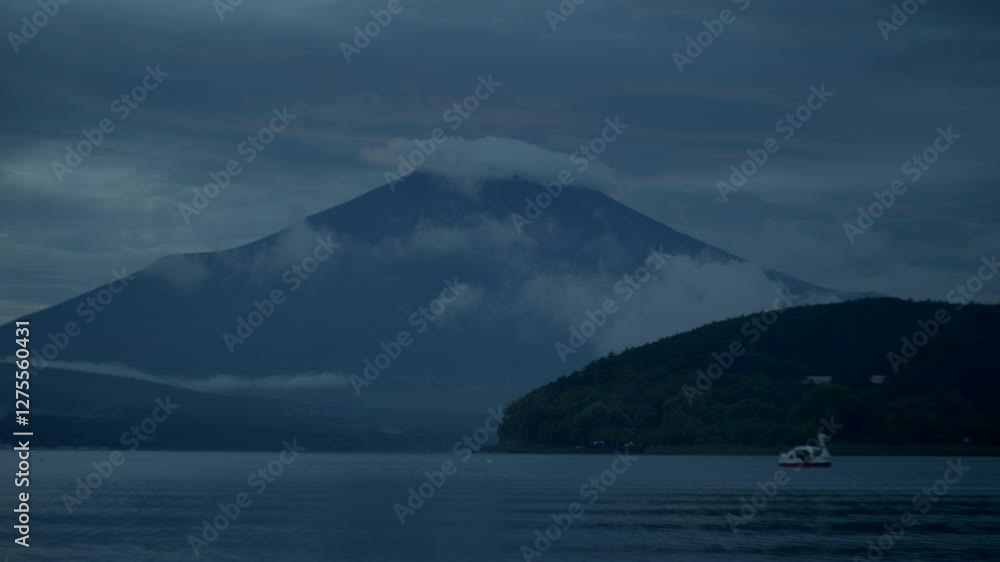 Twilight Over Yamanakako Lake and Fuji Silhouette – Stunning dusk scene with Mount Fuji’s silhouette against a deep blue sky over Yamanakako Lake Twilight Over Yamanakako Lake and Fuji Silhouette – Stunning dusk scene with Mount Fuji’s silhouette against a deep blue sky over Yamanakako Lake