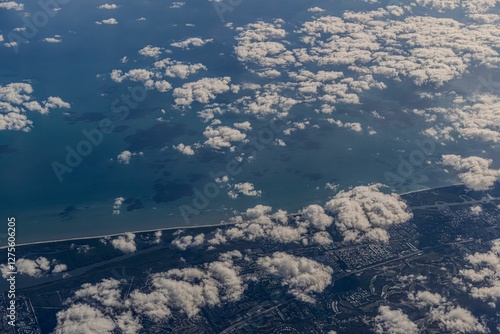 Fotografía Aerial view of coastal city and clouds.
