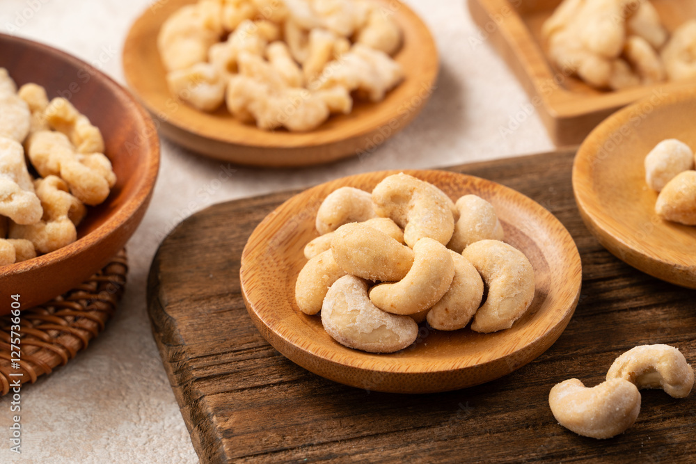 Flavored mixed nuts in bowls. Flavored mixed nuts in bowls.