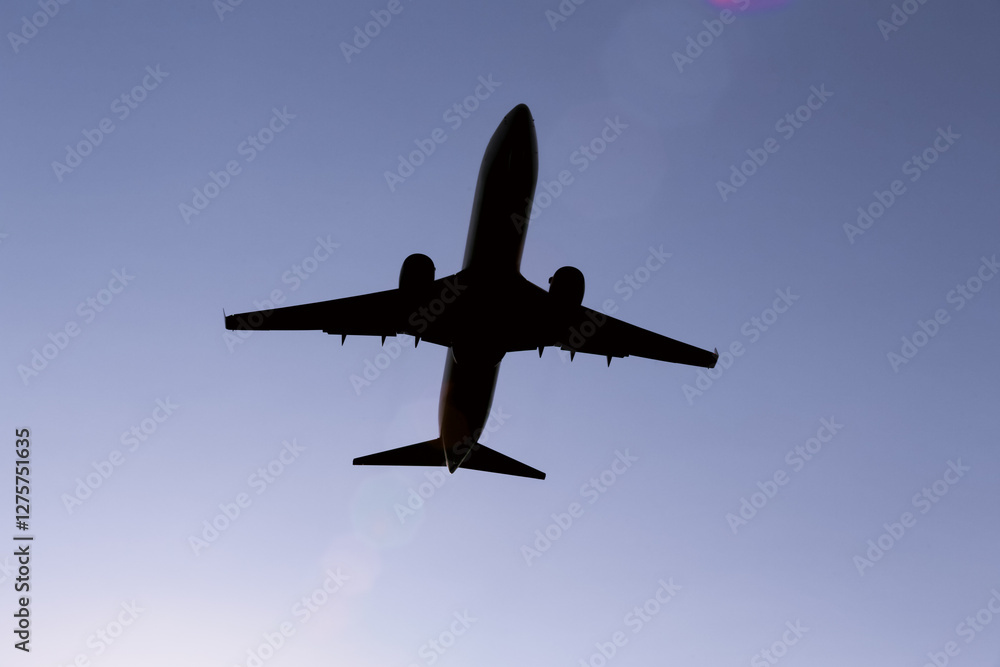 Silhouette Of A Commercial Airplane Taking Off Against A Stunning Sunset Sky Silhouette Of A Commercial Airplane Taking Off Against A Stunning Sunset Sky