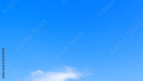 Soft blue sky with bokeh and blurred clouds