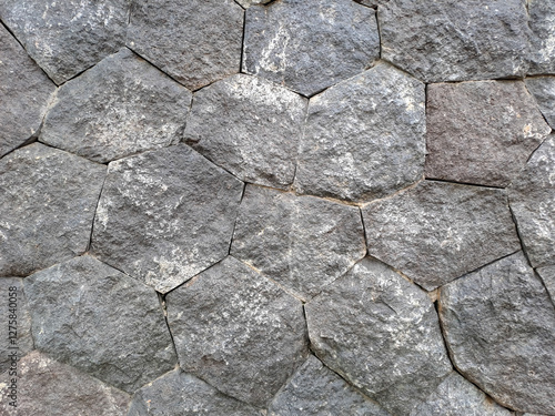 Stone wall texture. Old castle wall texture background. Stone wall as background or texture. Part of a stone wall, for background or texture photo