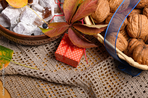 Sweet food Turkish delight on wooden background, assorted locum and candy as decorated backdrop photo