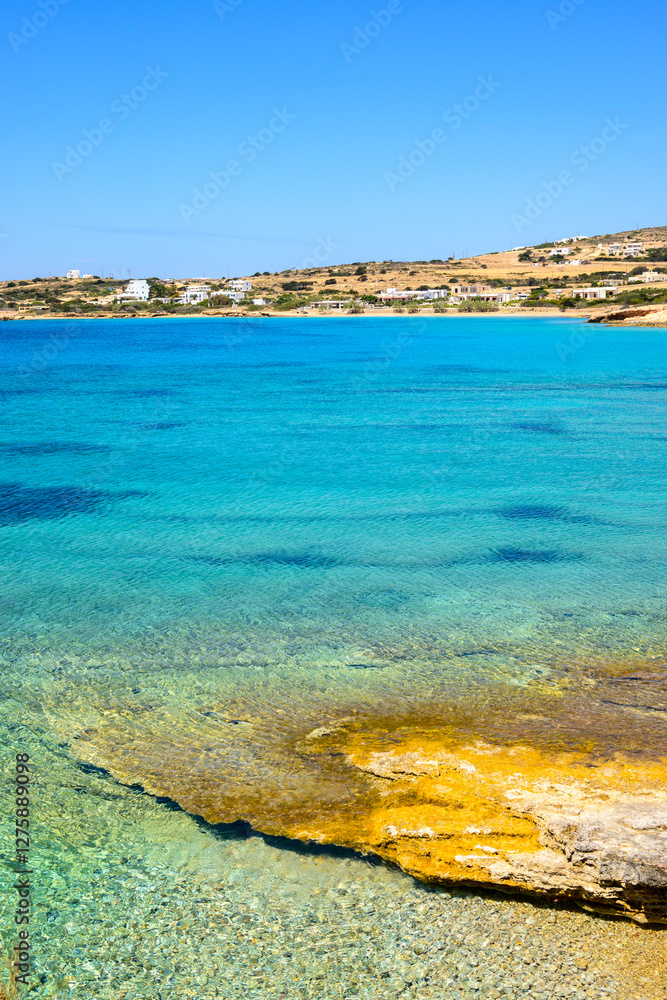 Koufonisia beach with clear water and rock formations. The south of Ano Koufonisi. Small Cyclades, Greece