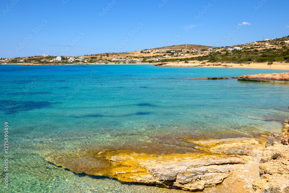 Koufonisia beach with clear water and rock formations. The south of Ano Koufonisi. Small Cyclades, Greece