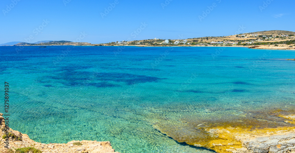 Koufonisia beach with clear water and rock formations. The south of Ano Koufonisi. Small Cyclades, Greece