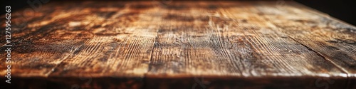 Close-up shot of a wooden table against a dark backdrop