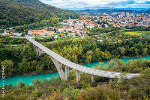 Aerial view of a big arch bridge over the Soca River and Nova Gorica town in western Slovenia. photo