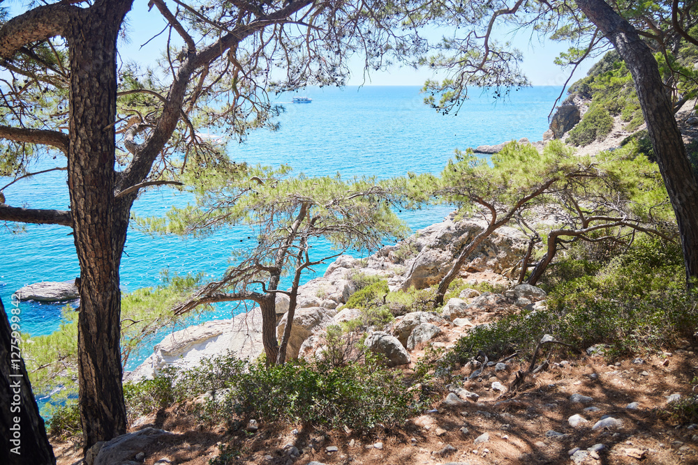 Lycian Trail in Turkey. Movement through the forest. The Mediterranean Sea is below Lycian Trail in Turkey. Movement through the forest. The Mediterranean Sea is below