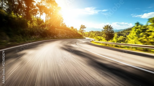 Motion blur effect on a curving mountain road with sharp turns, creating the feeling of speed and thrilling movement