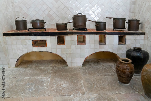 The kitchen inside the National Palace of Sintra. The kitchen decorated with pots and pans inside the National Palace of Sintra in Portugal