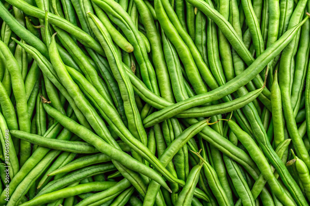 Fresh Green Beans: A vibrant close-up of a pile of fresh green beans, showcasing their natural texture, vibrant green color, and healthy appearance, perfect for culinary and healthy lifestyle themes. Fresh Green Beans: A vibrant close-up of a pile of fresh green beans, showcasing their natural texture, vibrant green color, and healthy appearance, perfect for culinary and healthy lifestyle themes.