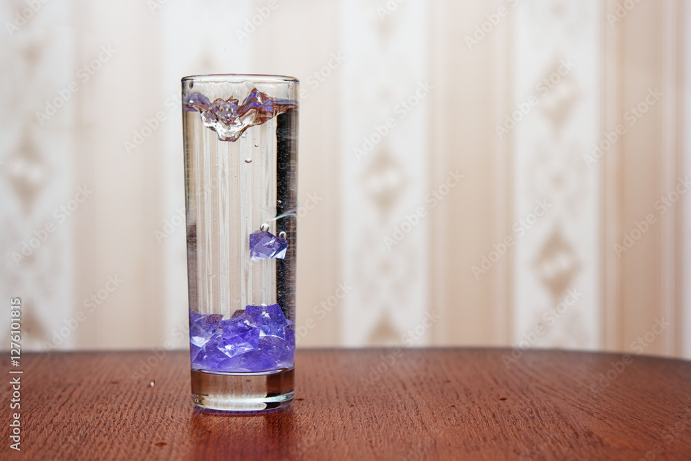 glass of water is on table