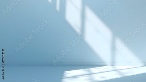 Empty white room with blue windows and a view of the blue sky