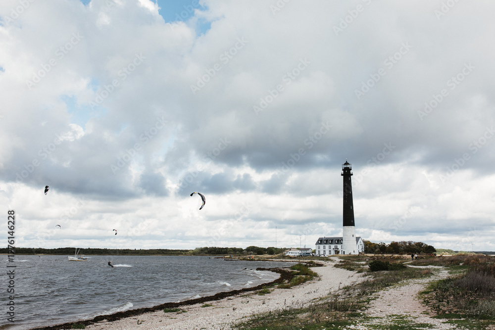 Obraz premium lighthouse on the shore of the sea