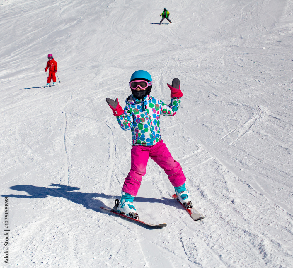 little girl in ski resort