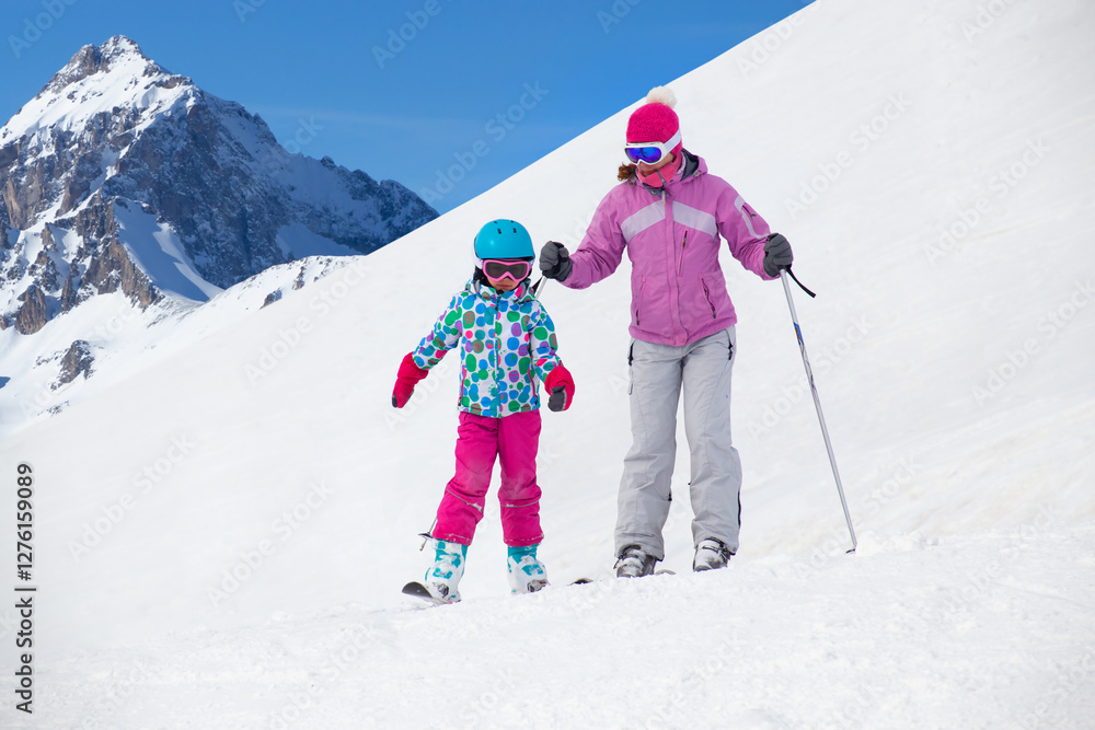 little girl in ski resort