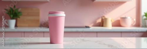 A single pink thermal coffee cup on a marble countertop, thermos, surface