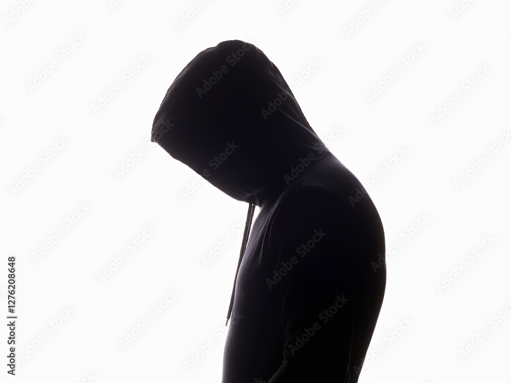 person in Hood silhouette. Man in a hooded sweatshirt